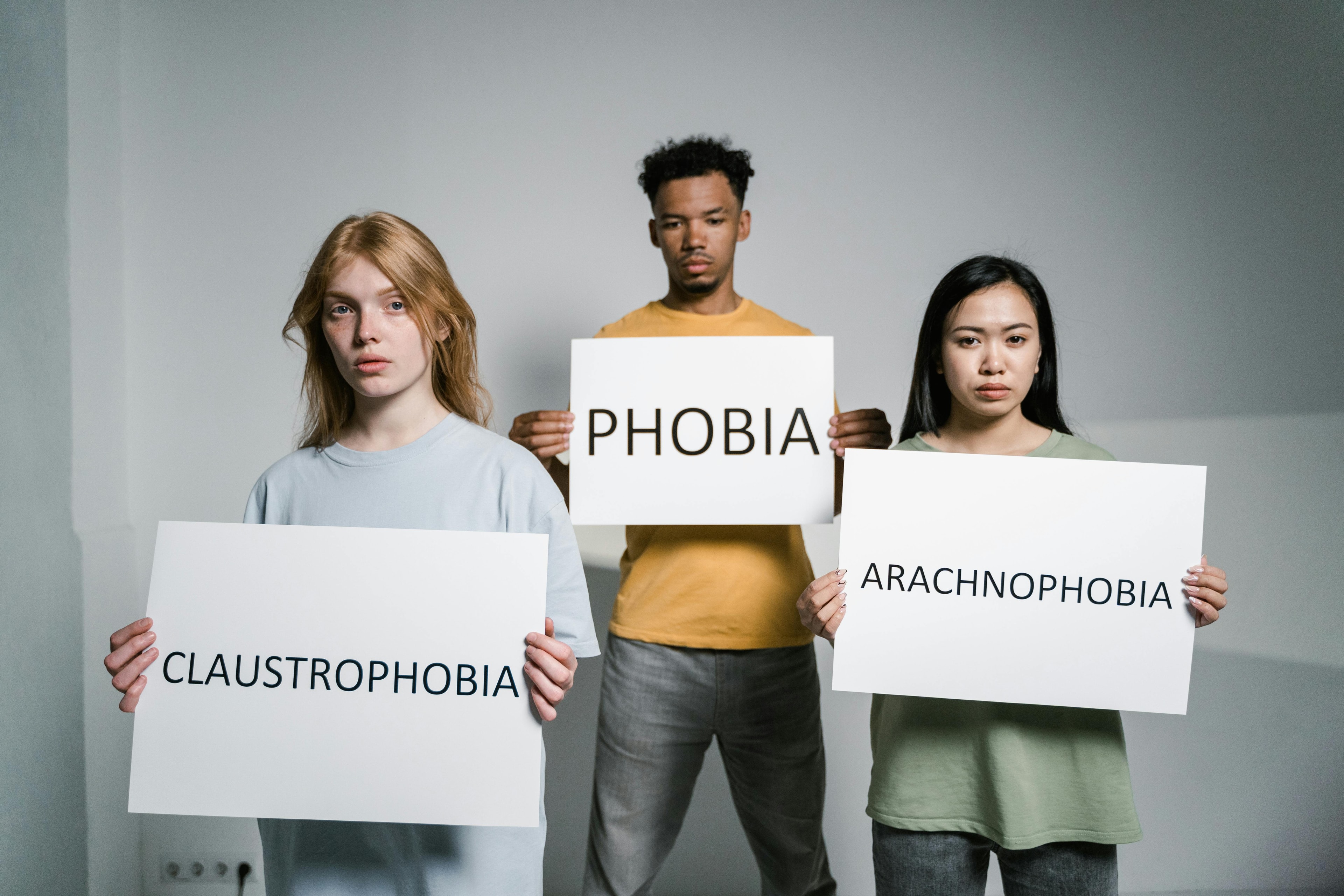 People holding boards of mental disorder